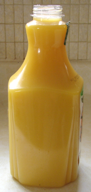 Usually Minute Maid orange juice 1.75L, poured into a 1.75L Simply Orange container should reach almost all the way to the top. Both containers are the 1.75L. Toronto, Canada. Photo by Don Tai