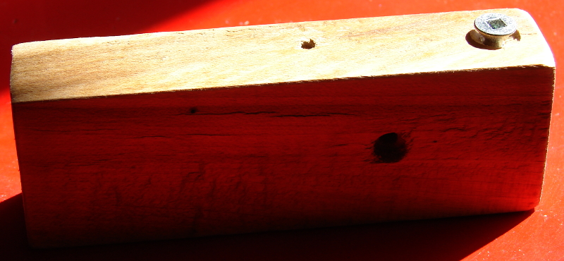 Very simple jig to cut tight dadoes: just a rectangular piece of wood and a metal screw. Photo 1 by Don Tai