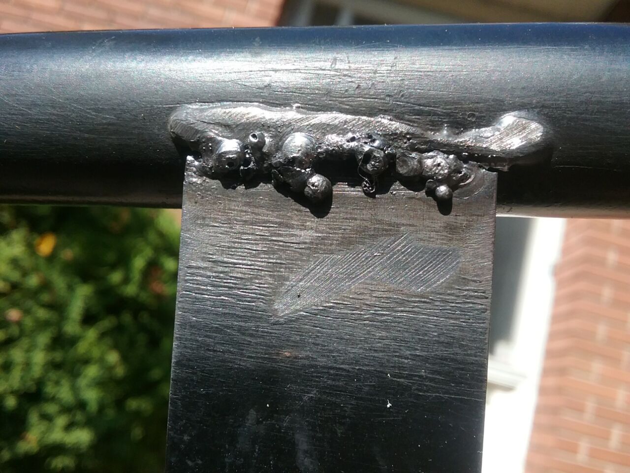 Reweld a broken slat on a cheaply made Chinese chair, 2020 Jan. Photo by Don Tai