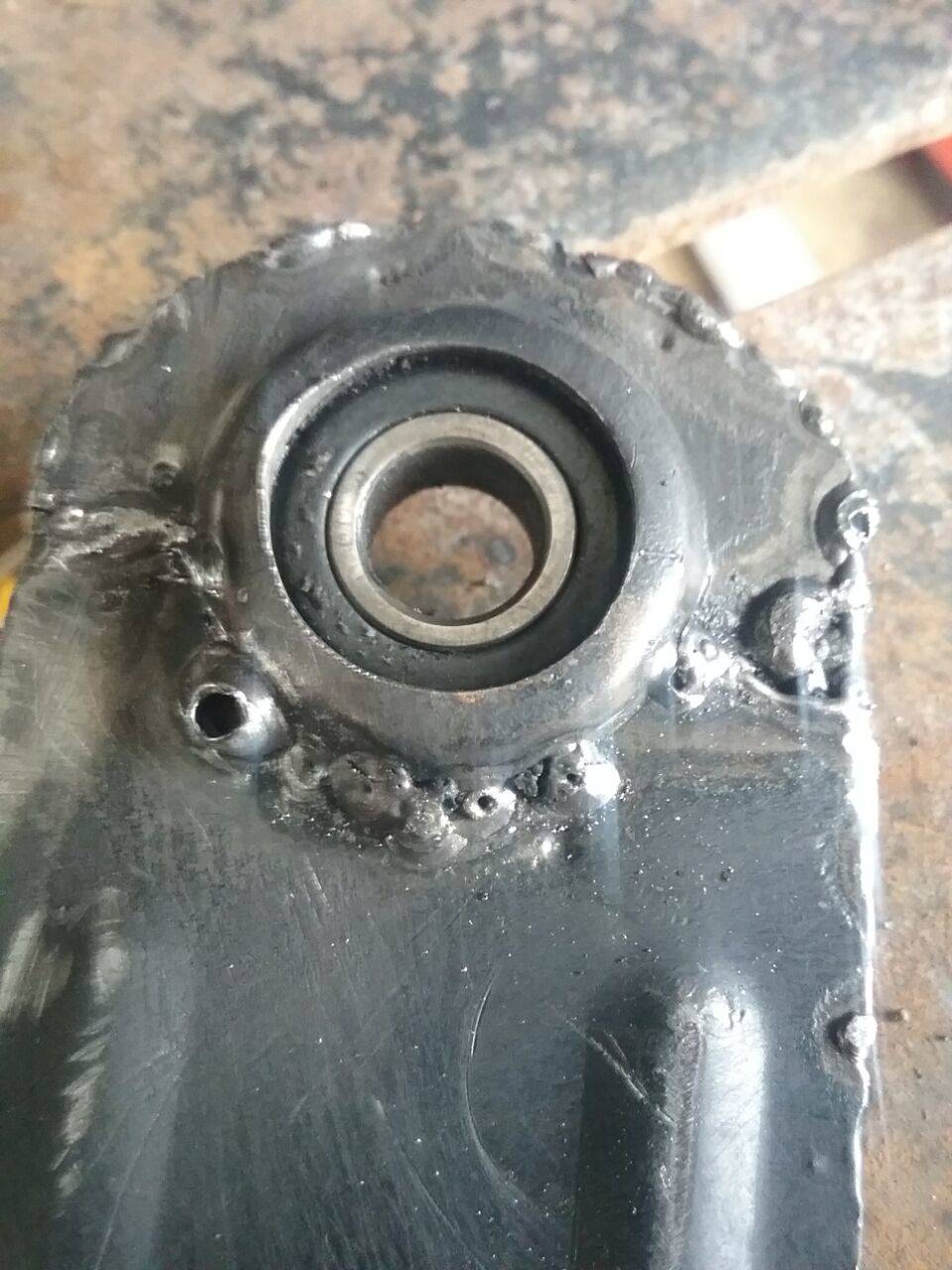 Chinese rocking chair, sheet metal bearing holder breaks, so I welded it up, 2021 Dec 11,. photo my Don Tai