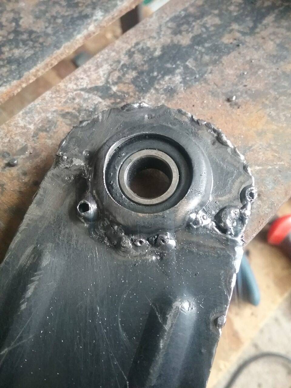 Chinese rocking chair, sheet metal bearing holder breaks, so I welded it up, 2021 Dec 11,. photo my Don Tai