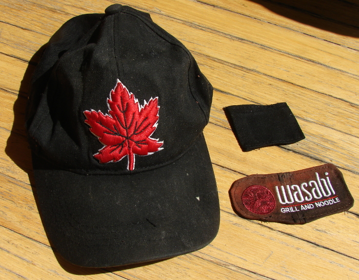 Wasabi Baseball Hat did not make it safely through the washing machine. What was left was only the logo. Neighbour wants the patch sewn onto a donor Maple Leaf hat. Photo 1 by Don Tai