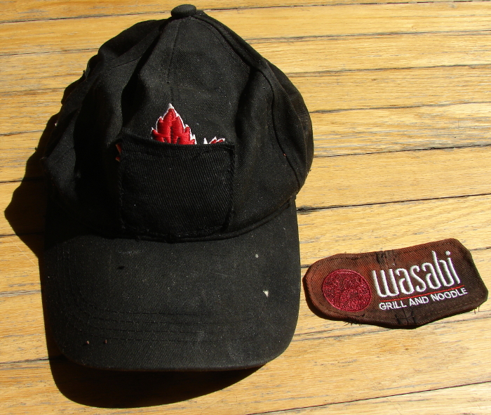 Wasabi Baseball Hat did not make it safely through the washing machine. What was left was only the logo. Black patch sewn over the bottom of the red maple leaf donor Maple Leaf hat. Photo 2 by Don Tai
